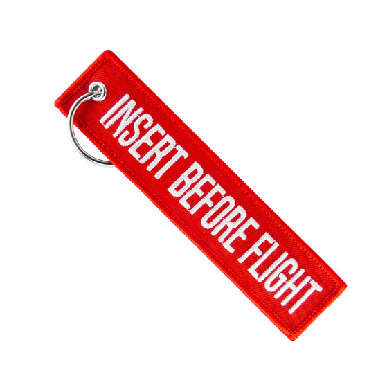 SCHLÜSSELANHÄNGER – INSERT BEFORE FLIGHT